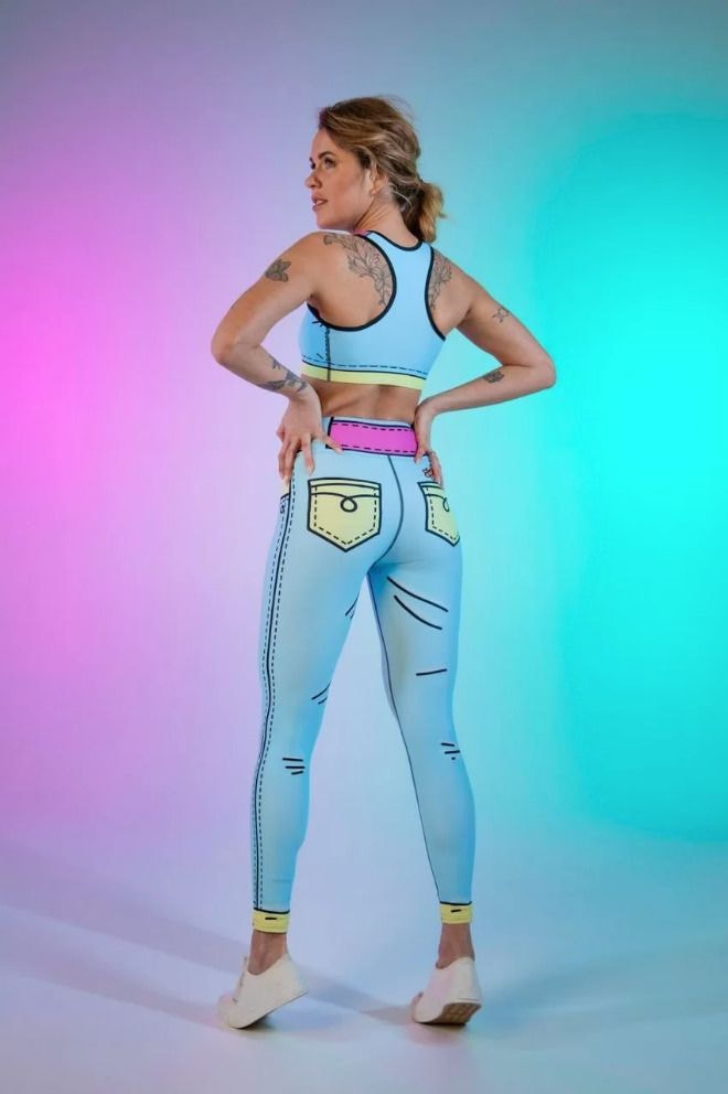 a woman in a tight blue outfit